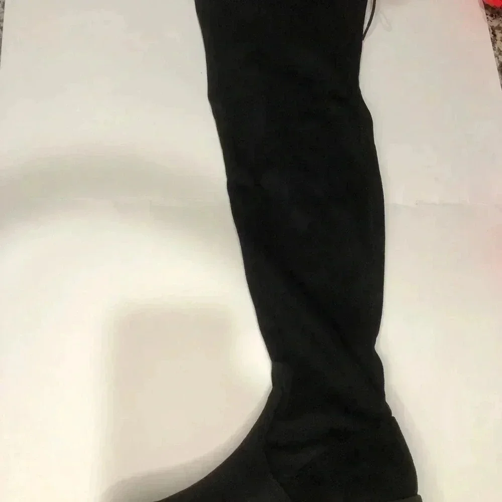 Over the knee stretch boots